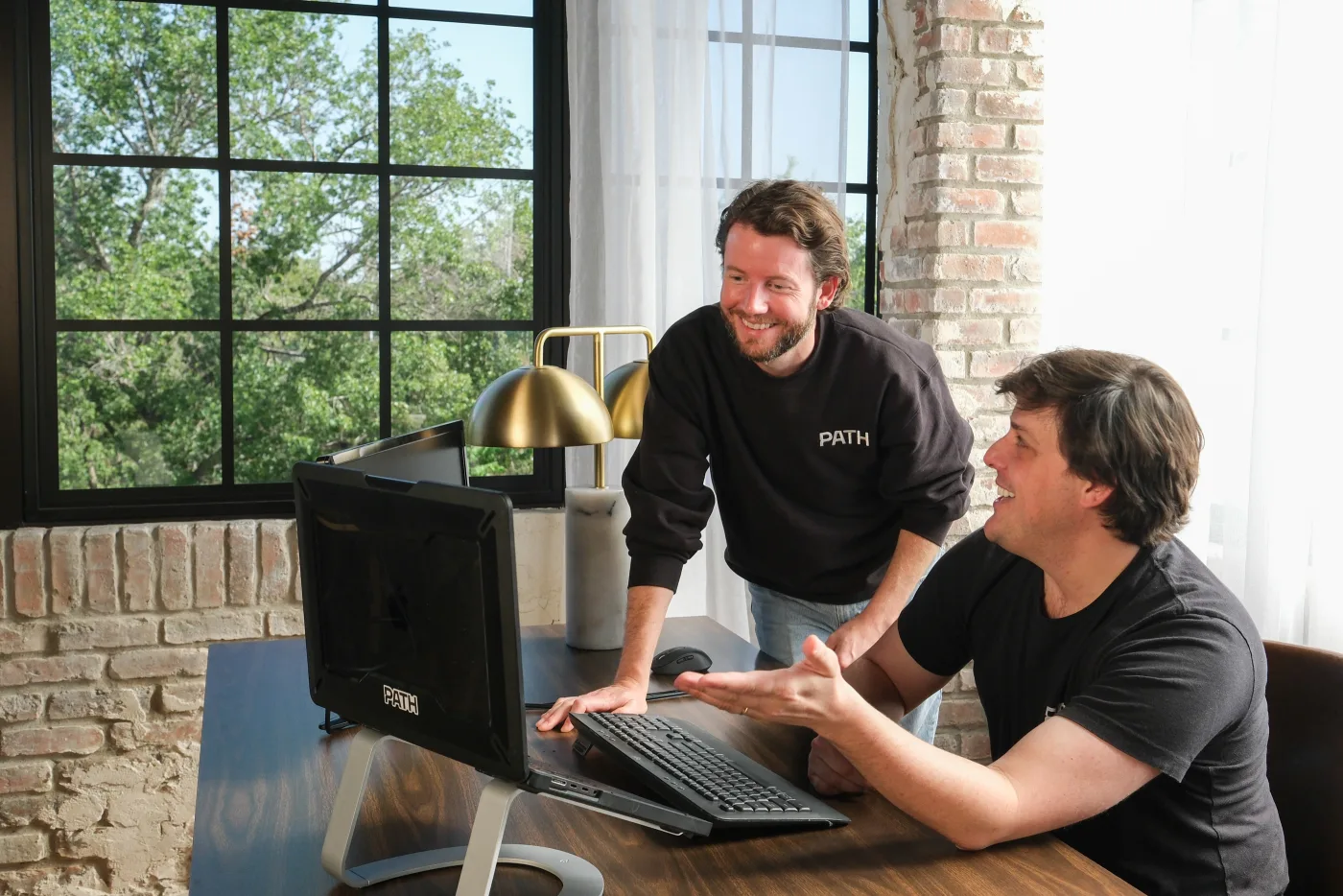 Path team members collaborating in the Austin office